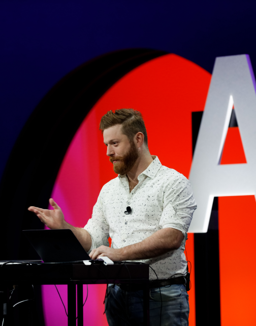 Person speaking at a conference